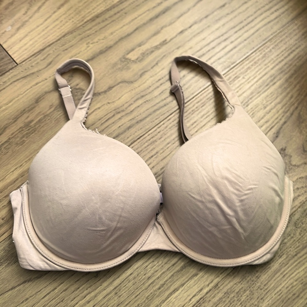Victoria’s Secret body by Victoria. 34D nude. Underwire.  Lightly padded.